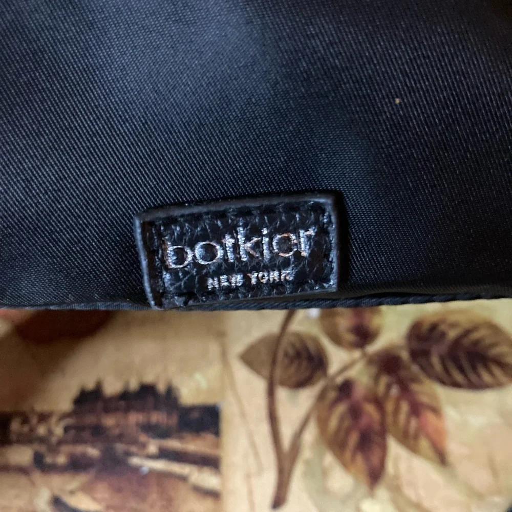 NWT Botkier mini trigger NYLON BACKPACK BLACK WITH GUITAR LIKE LOGO STRAPS